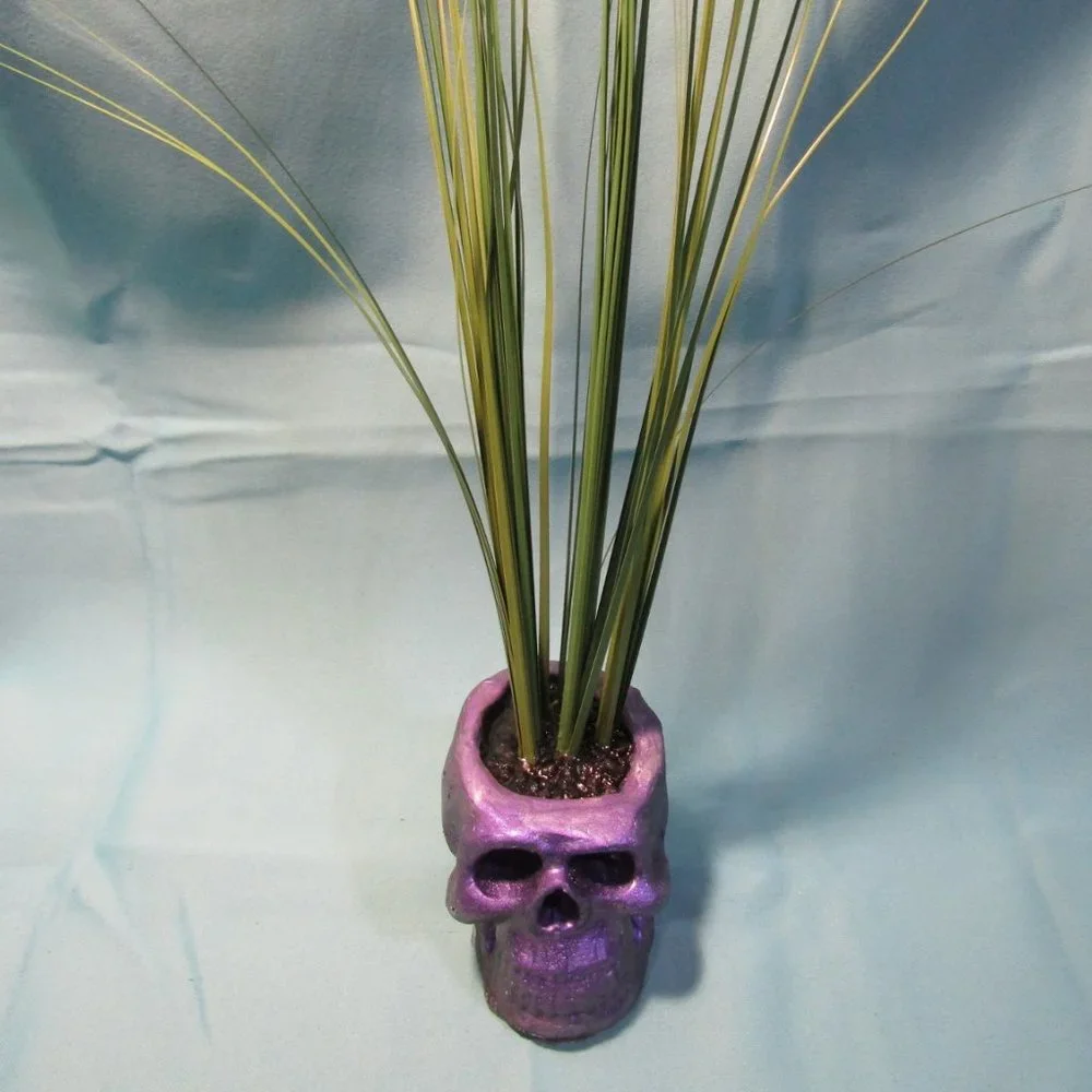 Aquarium Decoration - Purple Zombie Skull with Tall Green Plant.